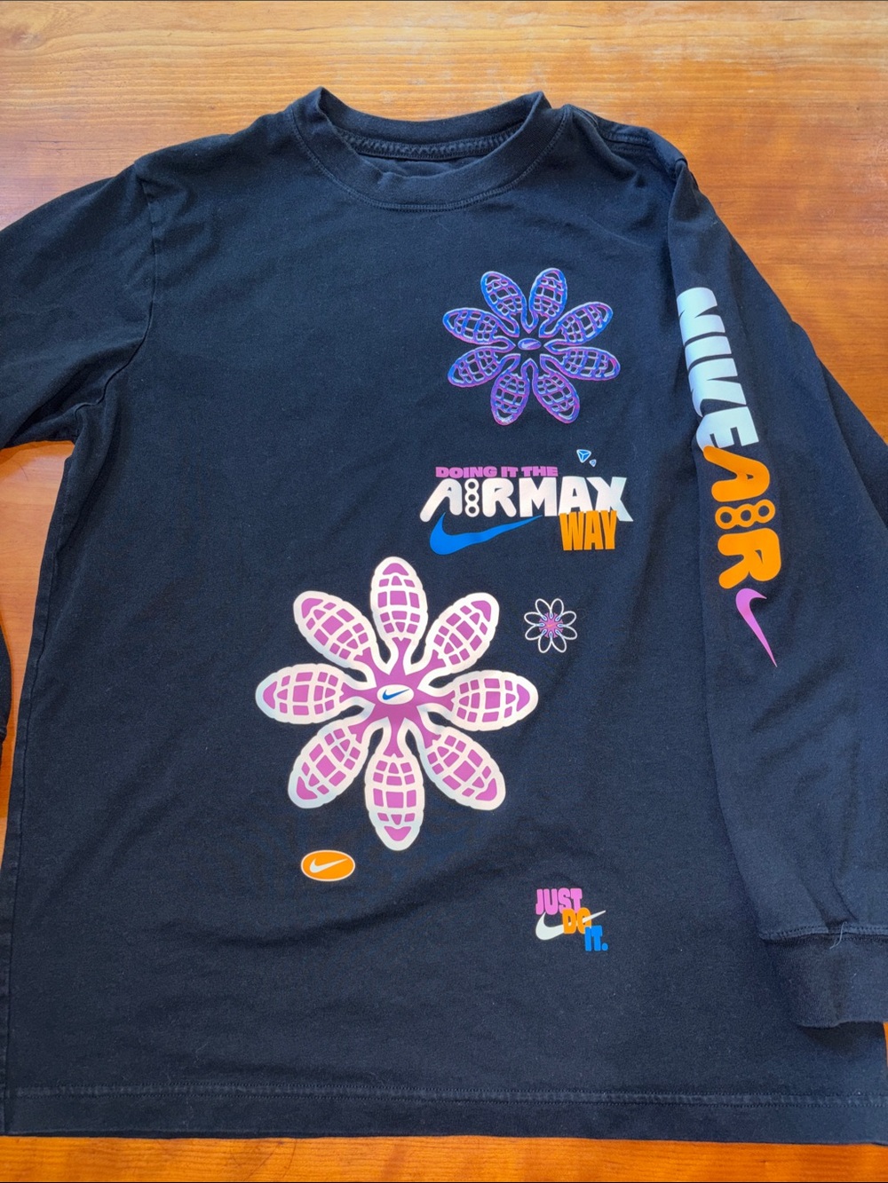 🆕 Nike Black Long-Sleeve Tee with Pink & Purple Flower Graphics